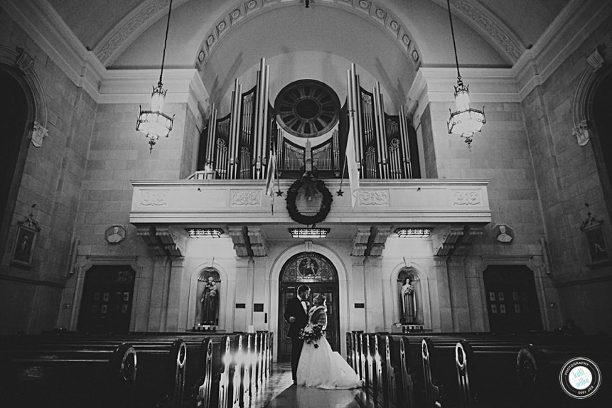 couple portrait in black and white in church located in wilmington delaware