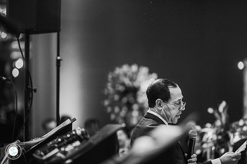 black and white photo of a father's wedding speech at the logan hotel in philadelphia
