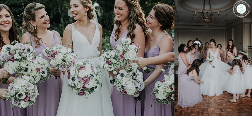 brides smile together with their wedding flowers if white and purple roses and lavender dresses and help the bride get ready