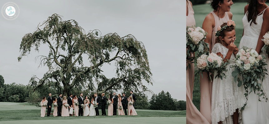 wedding party in front of an oak tree at penn oaks in west chester pa