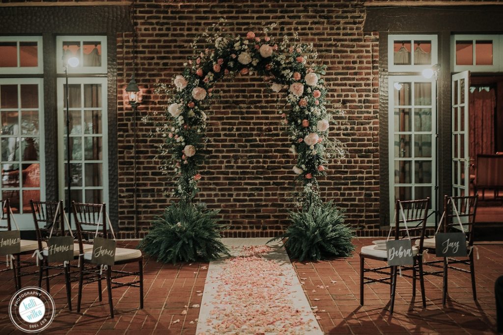 Wedding Arch made by flowers by Yukie with peonies . Greenville Country Club wedding 