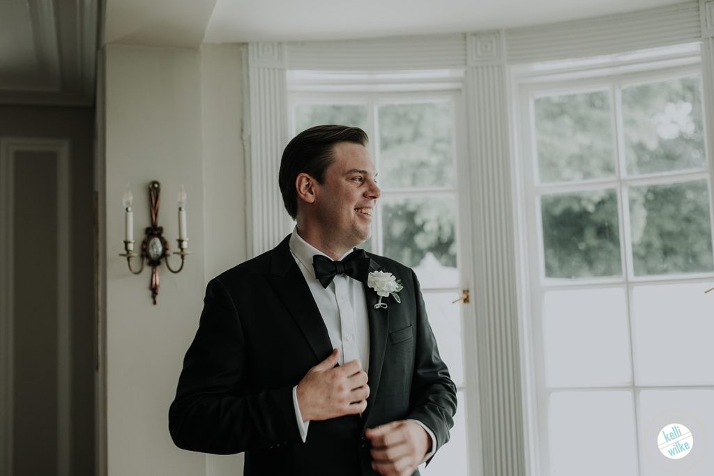 Groom smile before his wedding ceremony at Greenville Country Club in Greenville Delaware