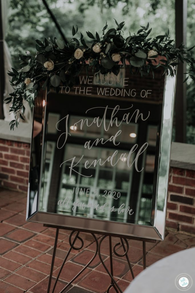 Hand calligraphy mirror welcome sign for a Greenville Country Club wedding in Greenville DE 