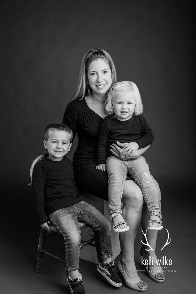 mothers with her son and daughter black and white portrait